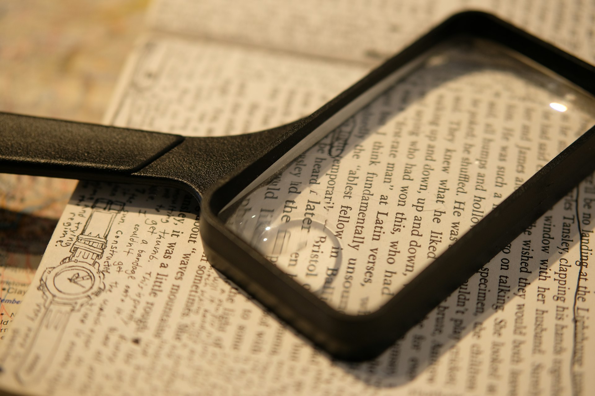 A magnifying glass over a document