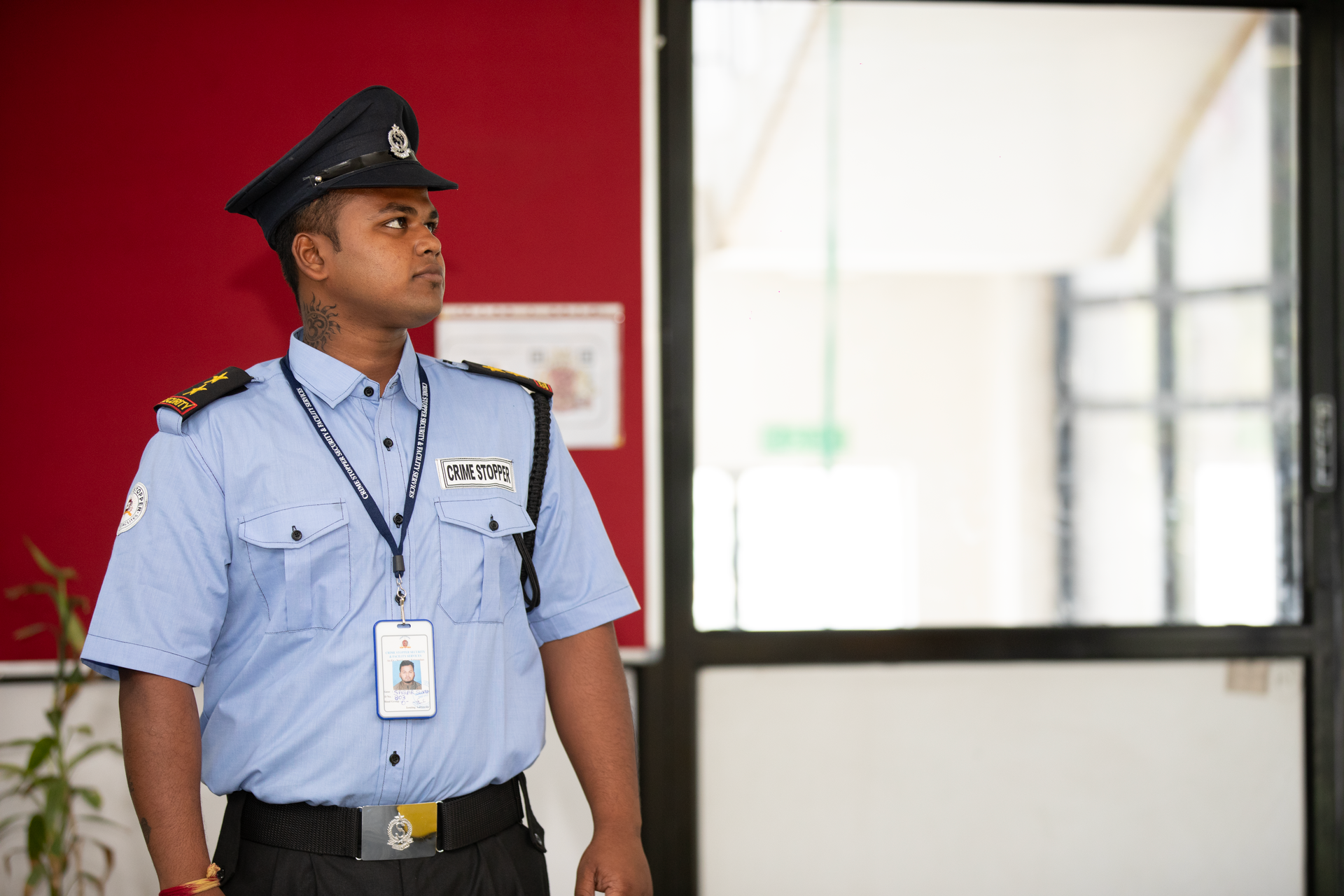 A security guard at an entrance