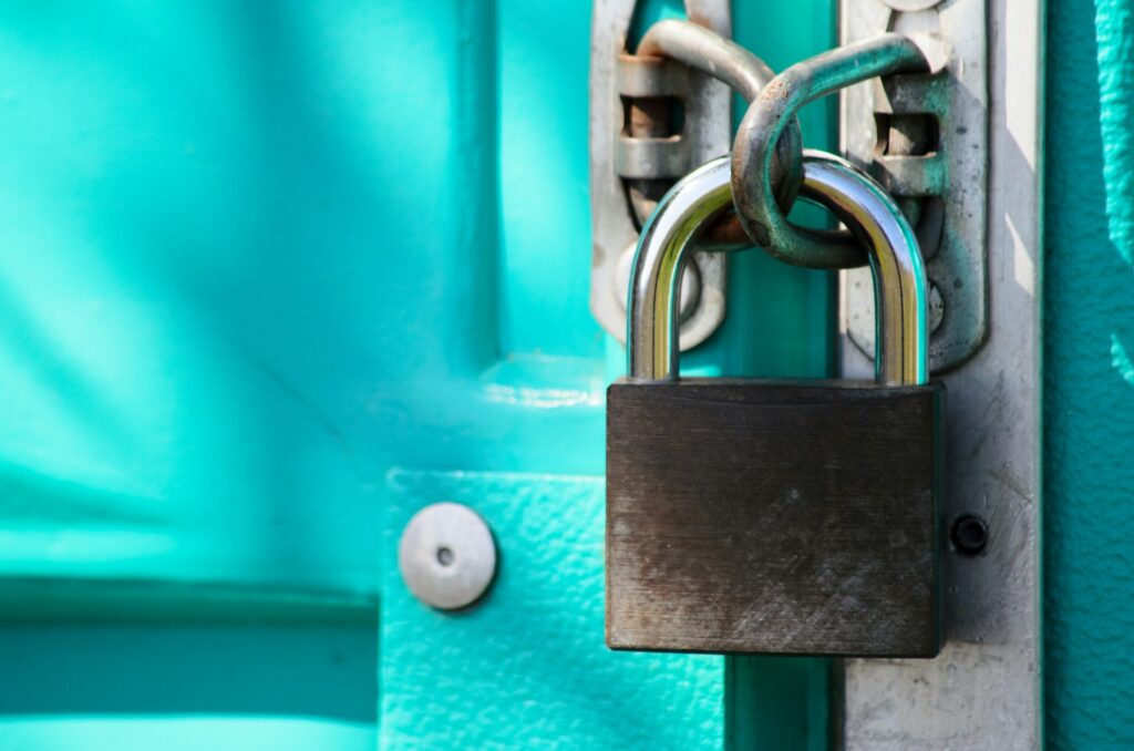 A padlock on a gate