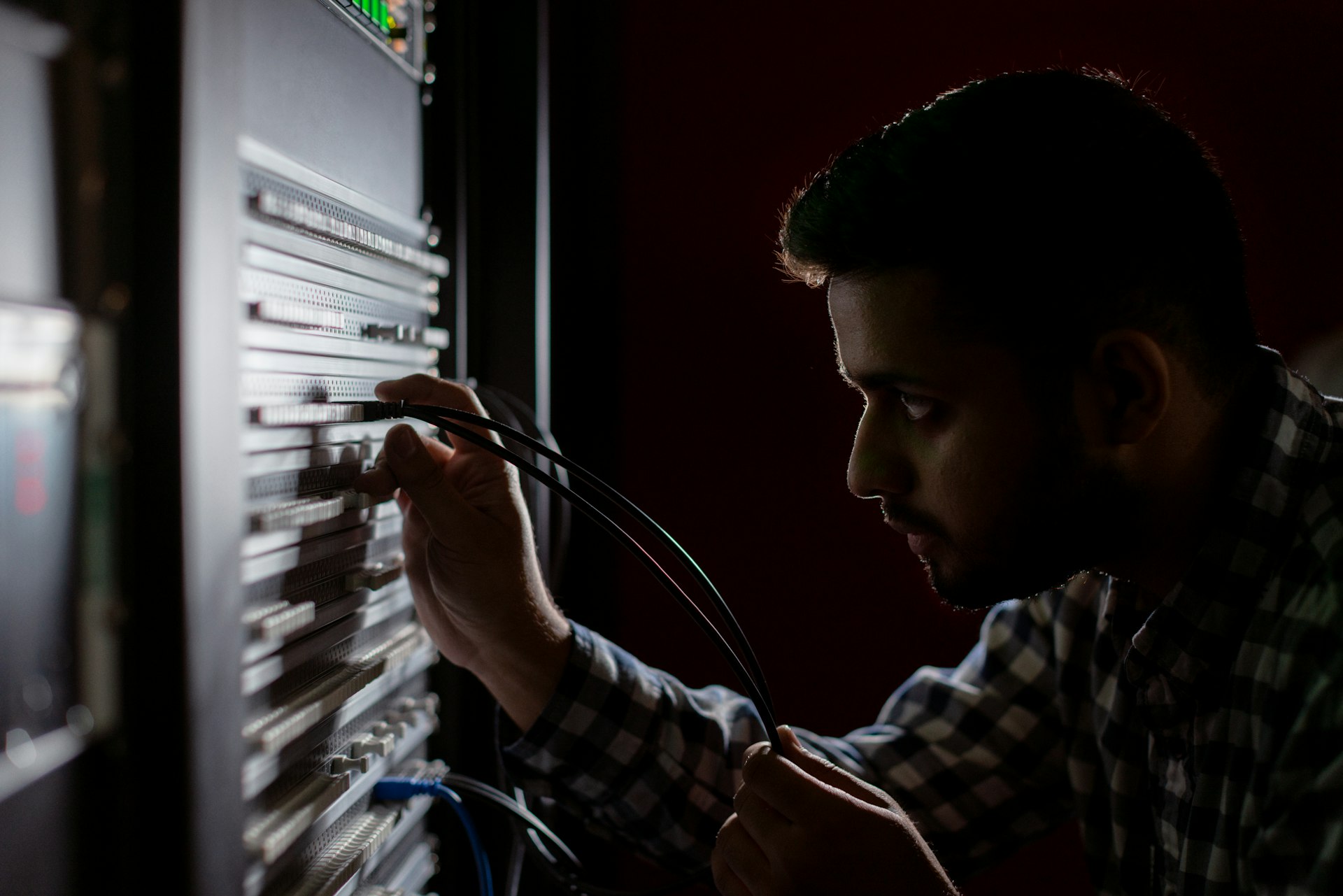 An engineer checking a server