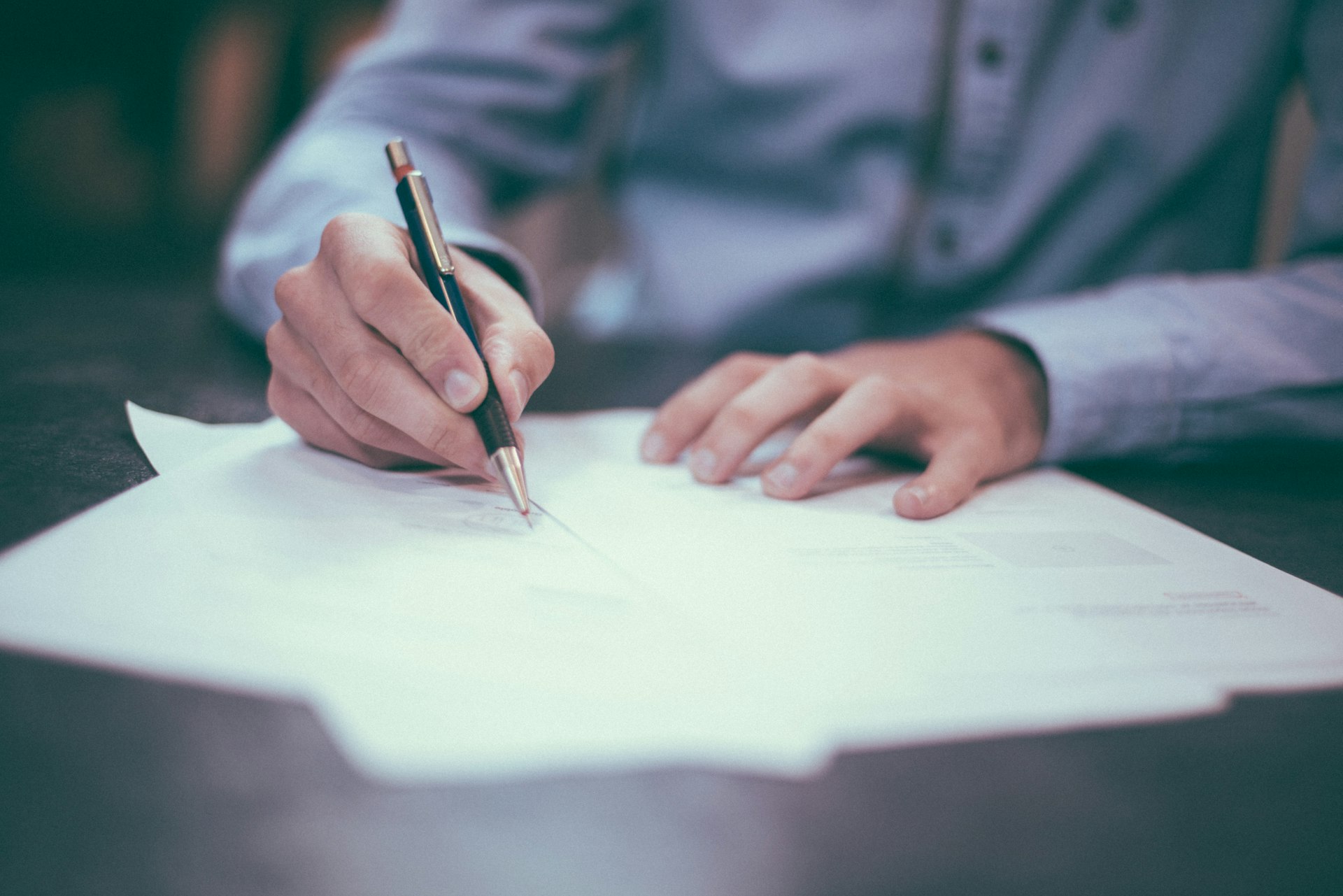 A contract being signed