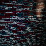 JavaScript framework code in an editor on a monitor
