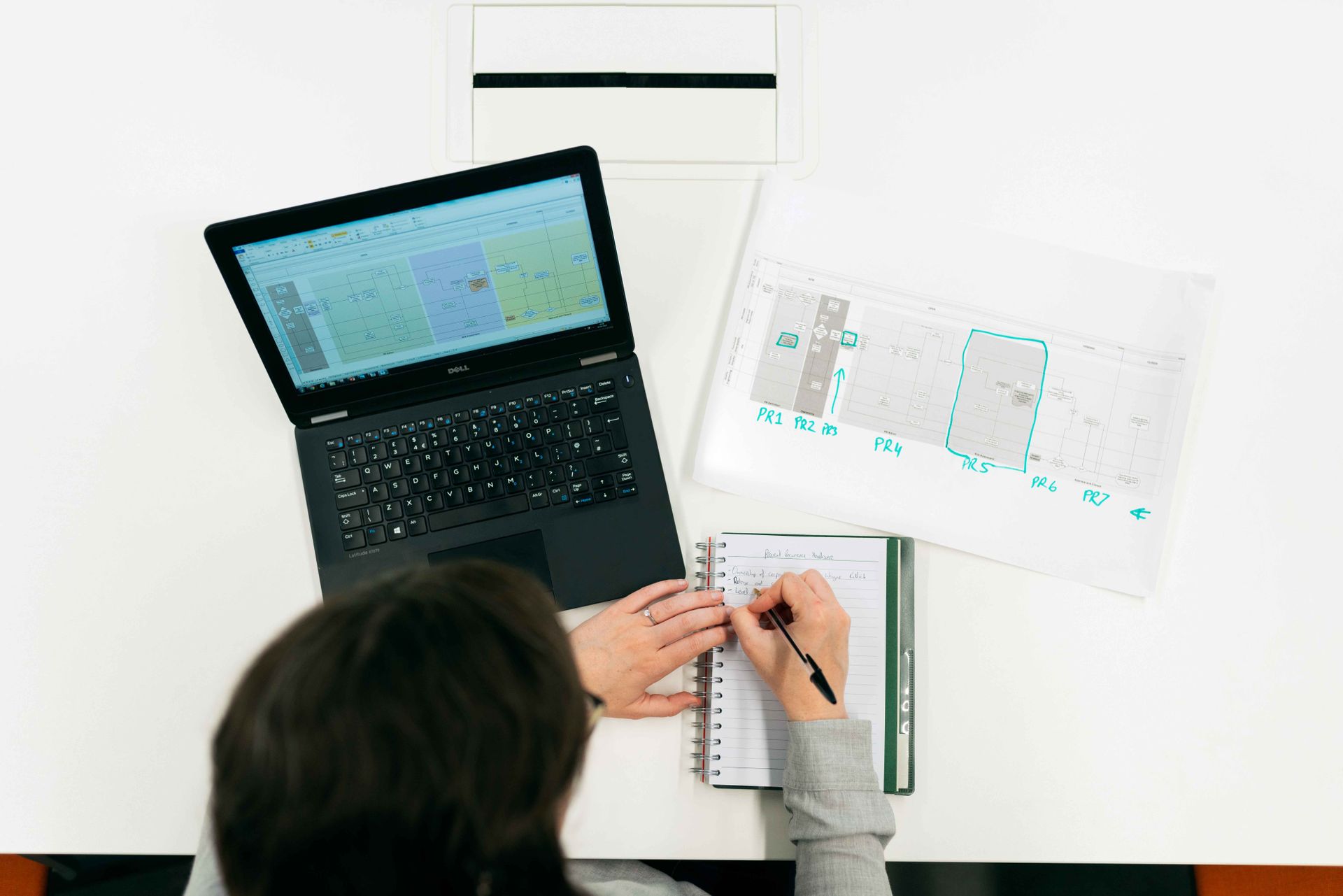 A notebook with diagrams