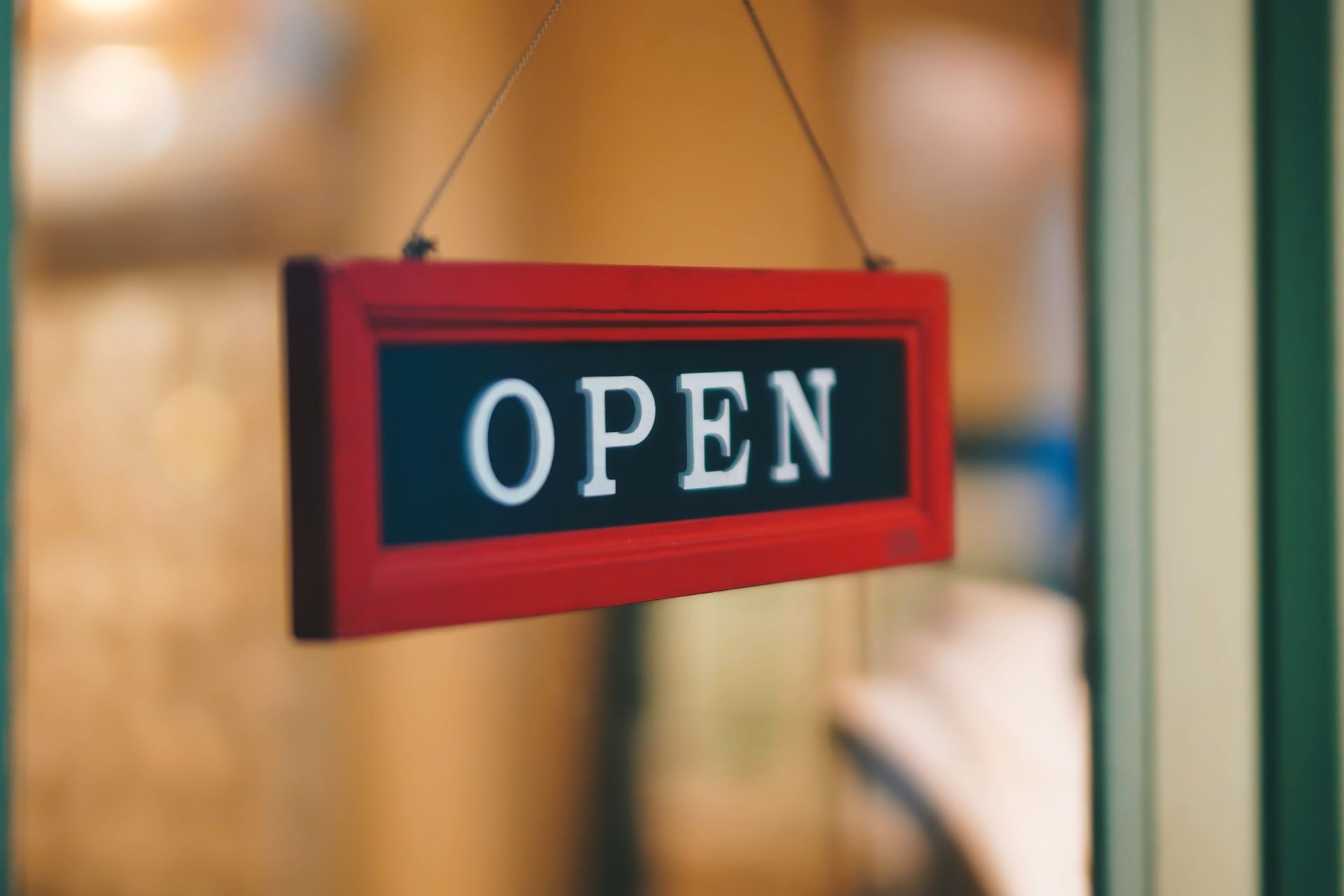An open sign in a shop window