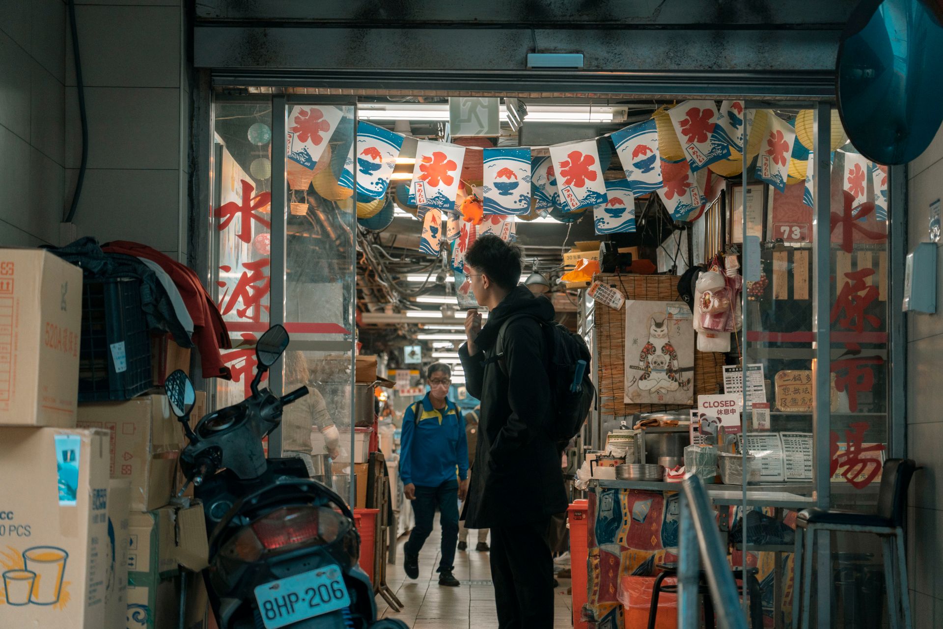 A customer walking into a shop
