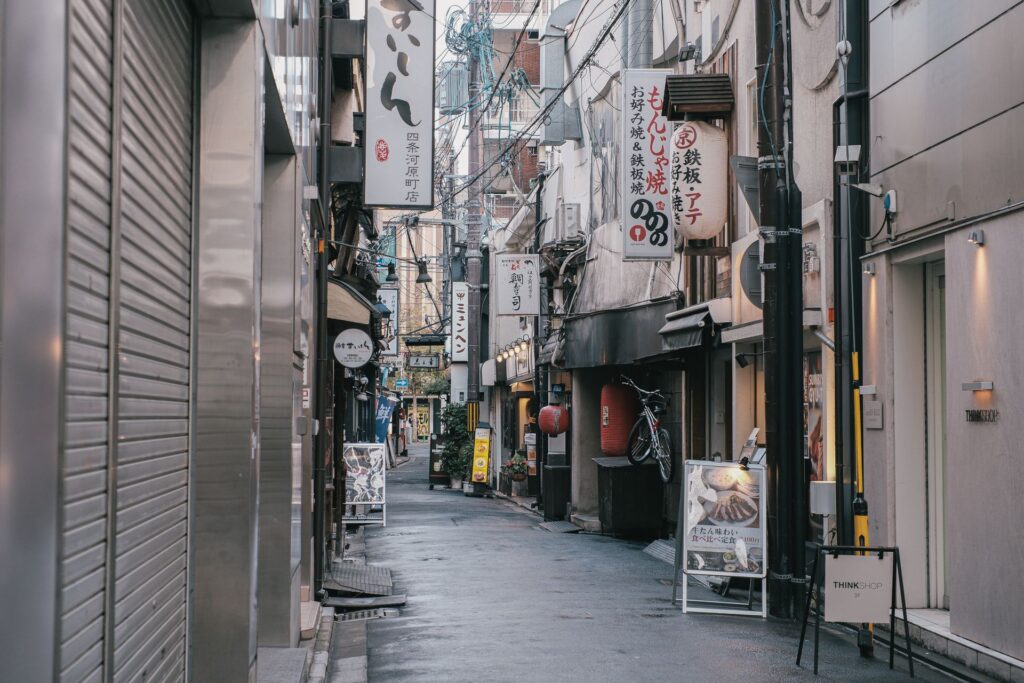 A city street with shop fronts