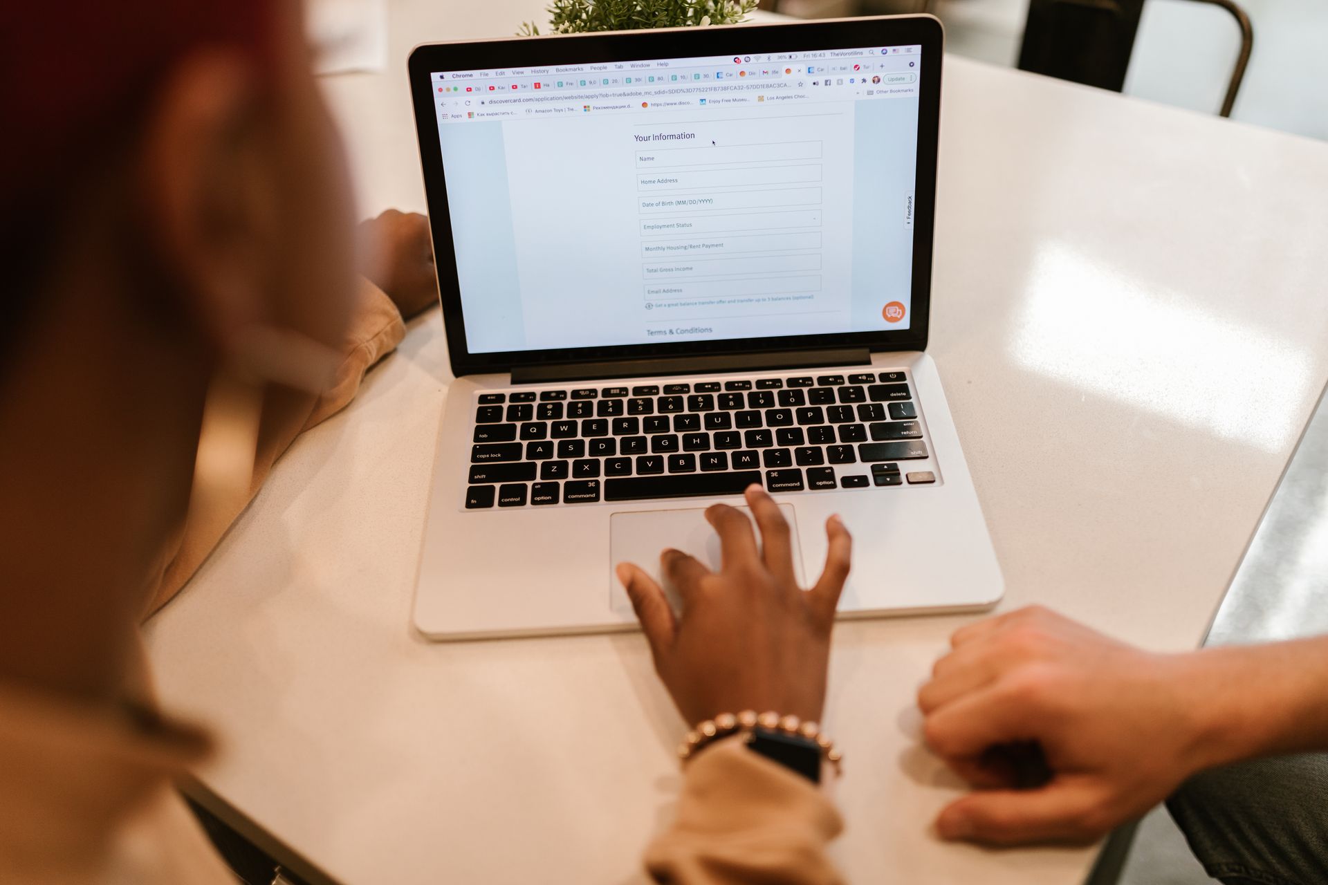 An online application form open on a laptop