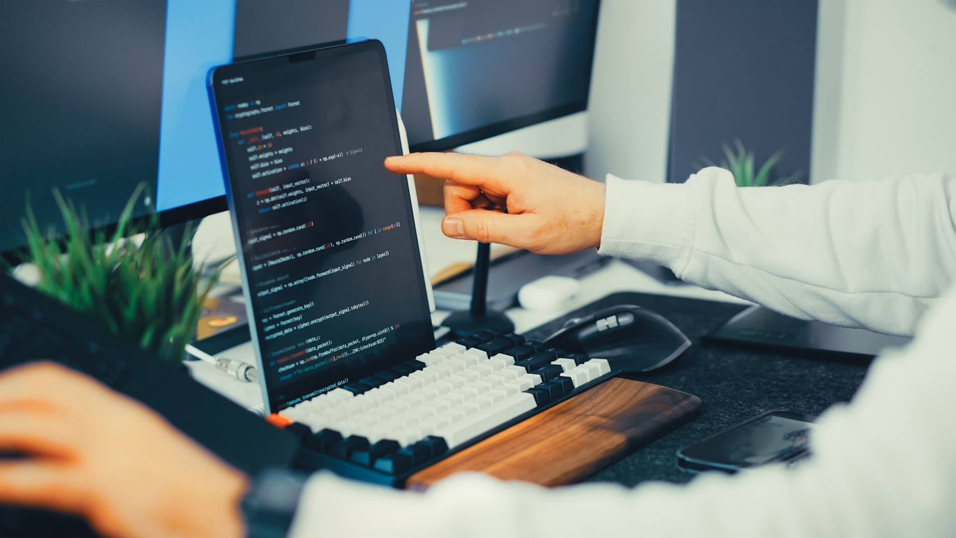 A developer testing a site on several phones