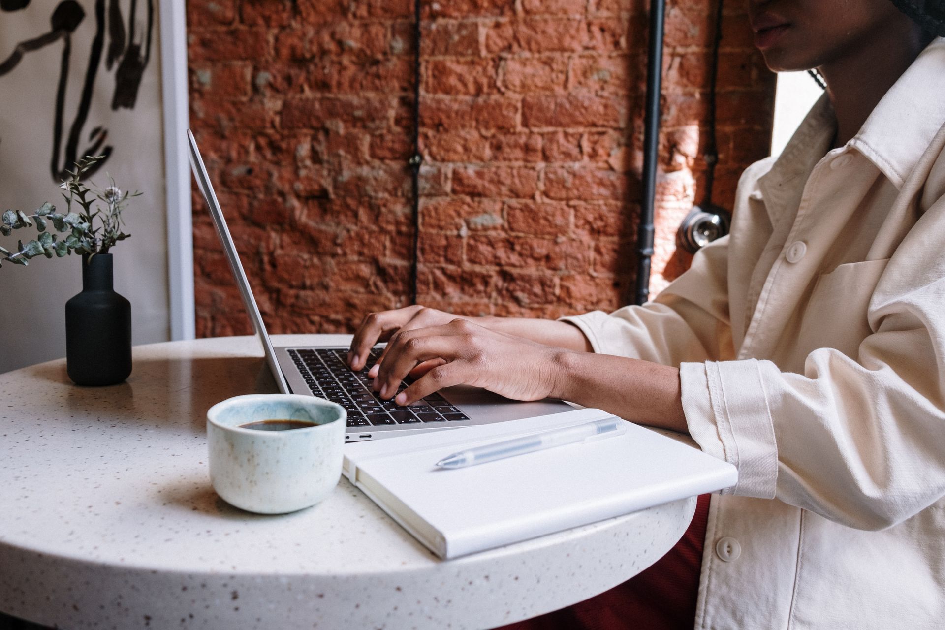 A woman writing a blog post