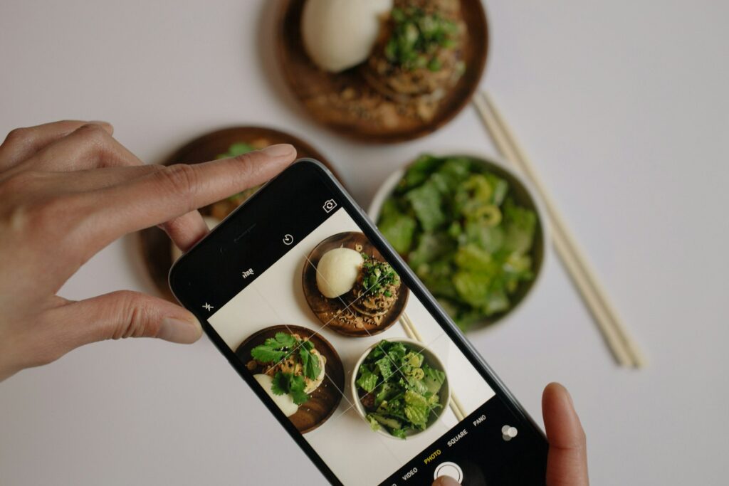 A food blogger photographing a dish