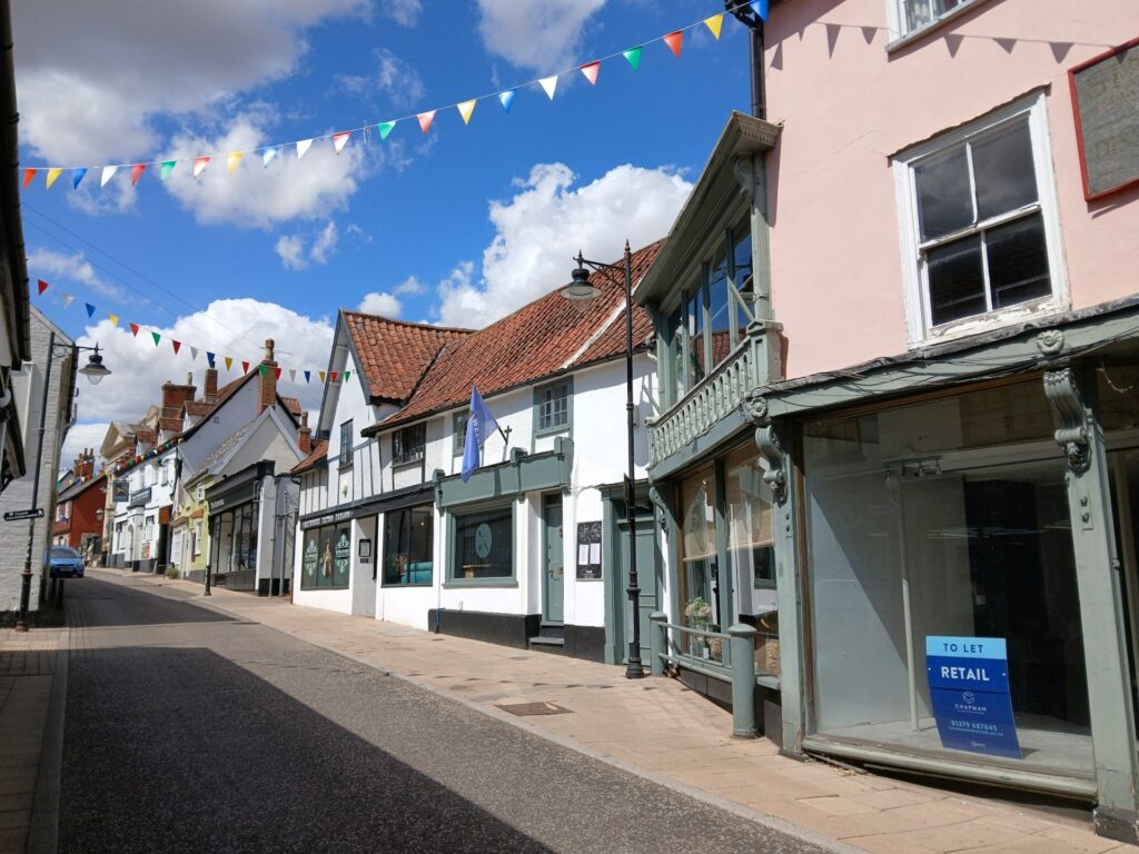 A row of shop fronts on a high street