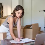 A small business owner at a laptop