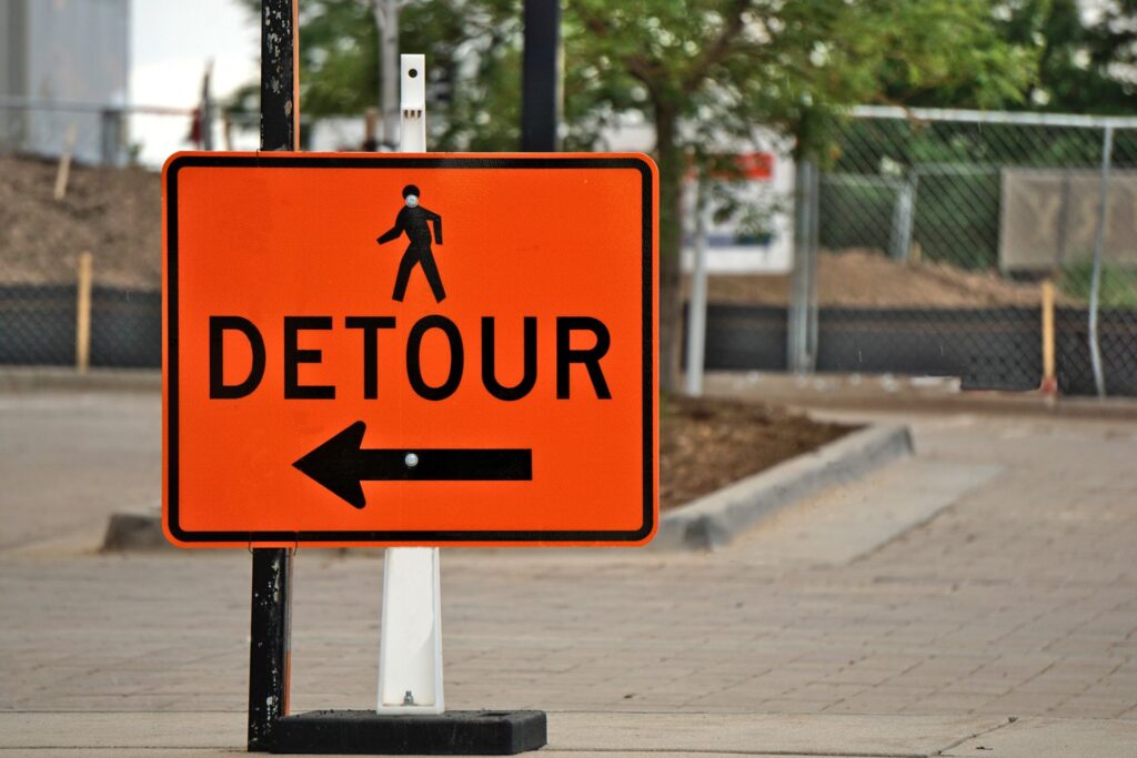 A road detour sign