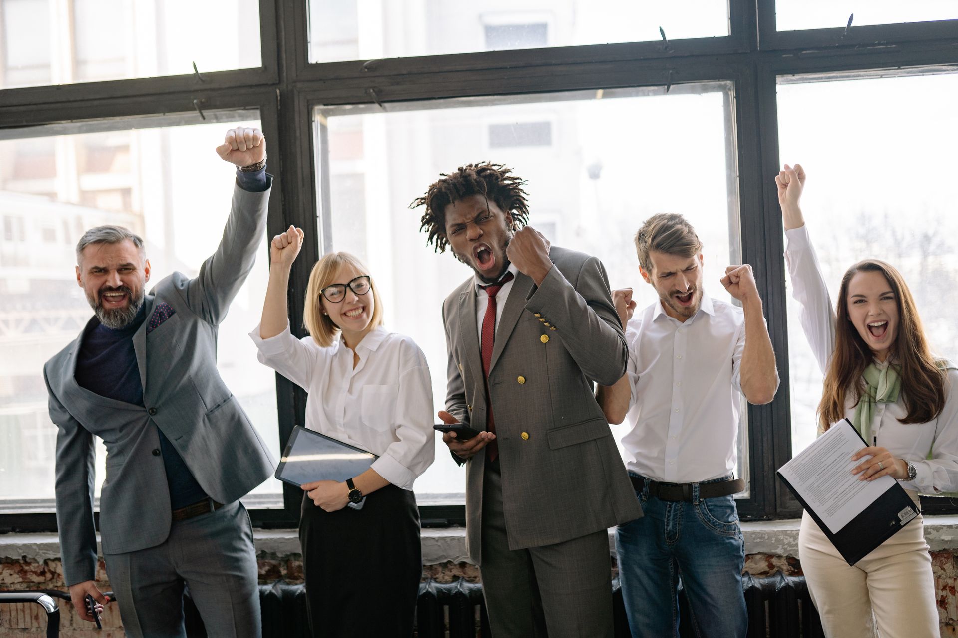 A team celebrating in an office