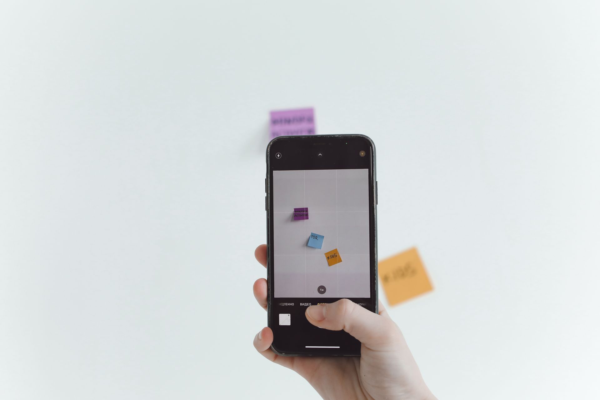A phone showing an image grid