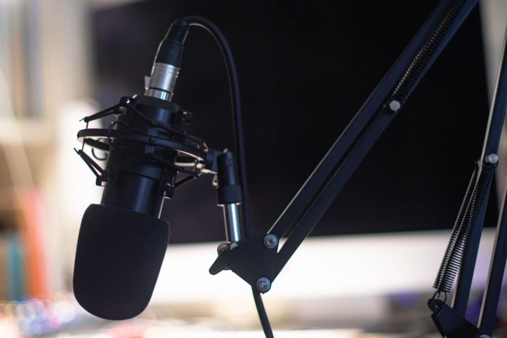 A podcast microphone in a studio