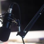 A podcast microphone in a studio
