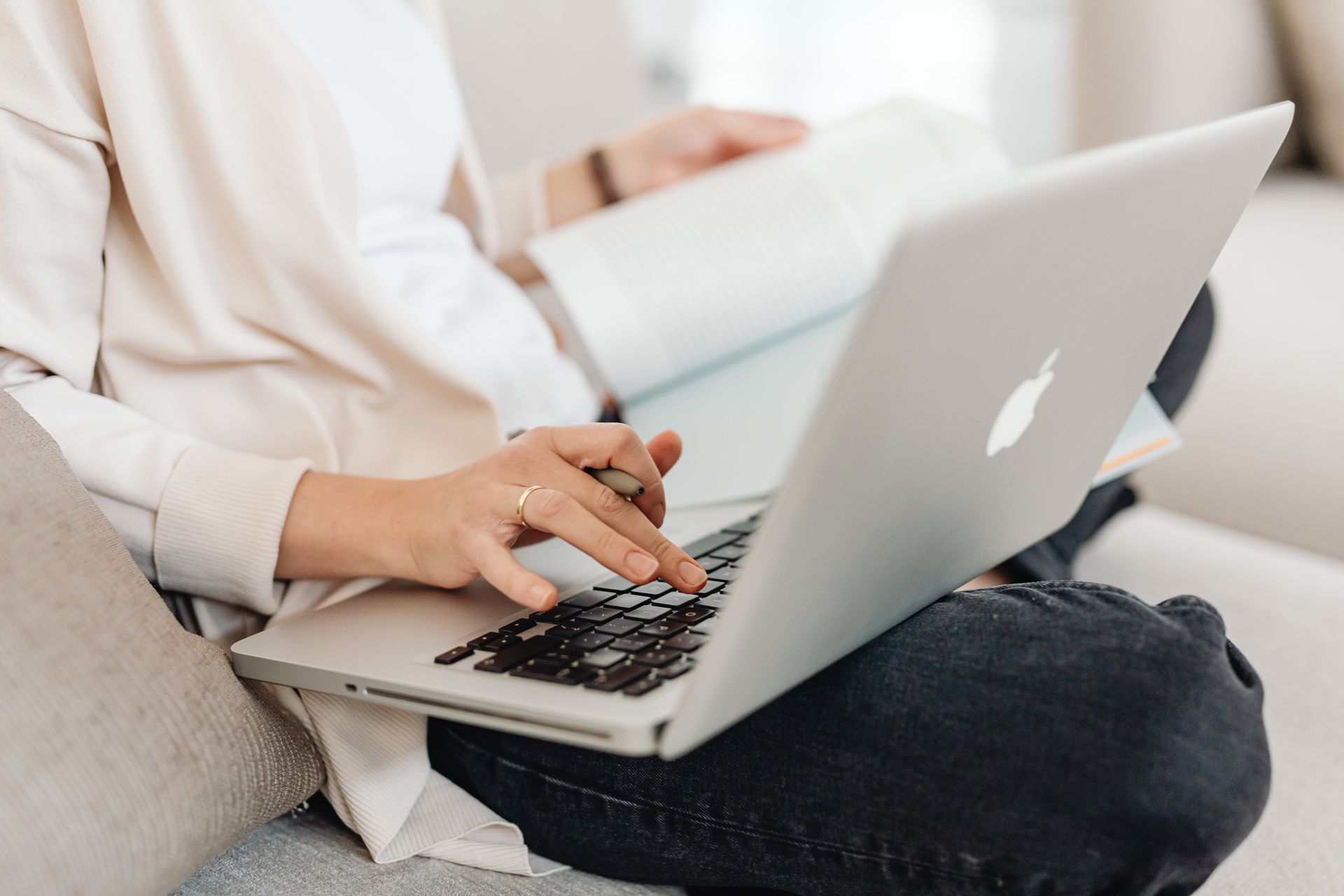 A publisher reading terms and conditions on a laptop