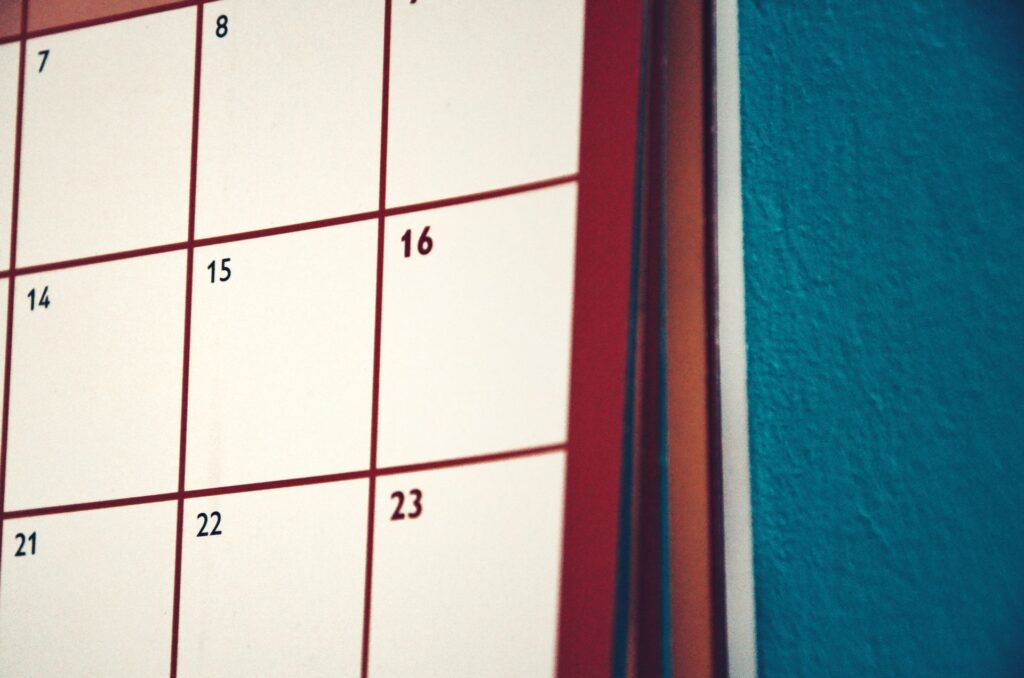 A monthly calendar on a wall