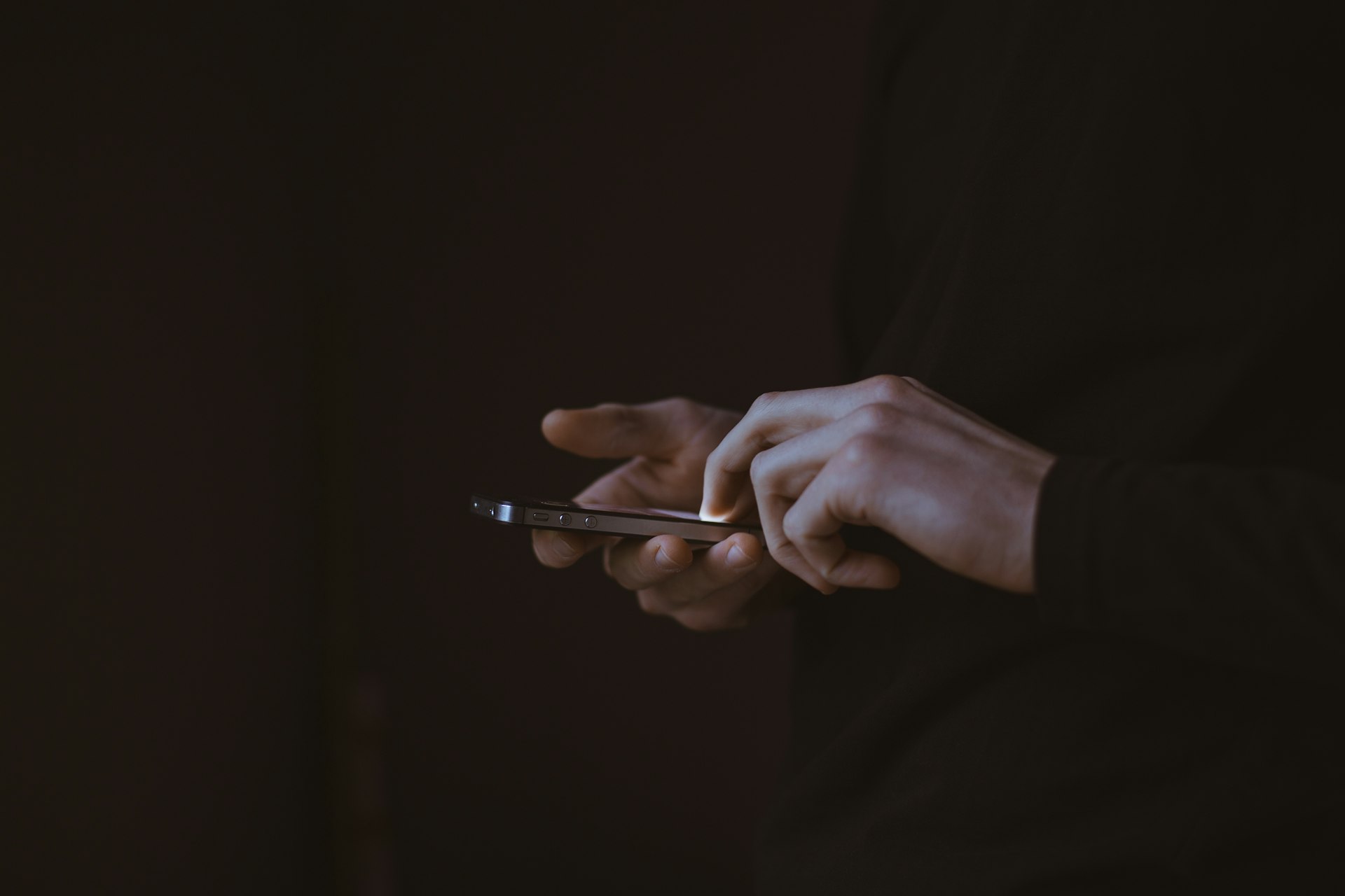 A person reading on a phone