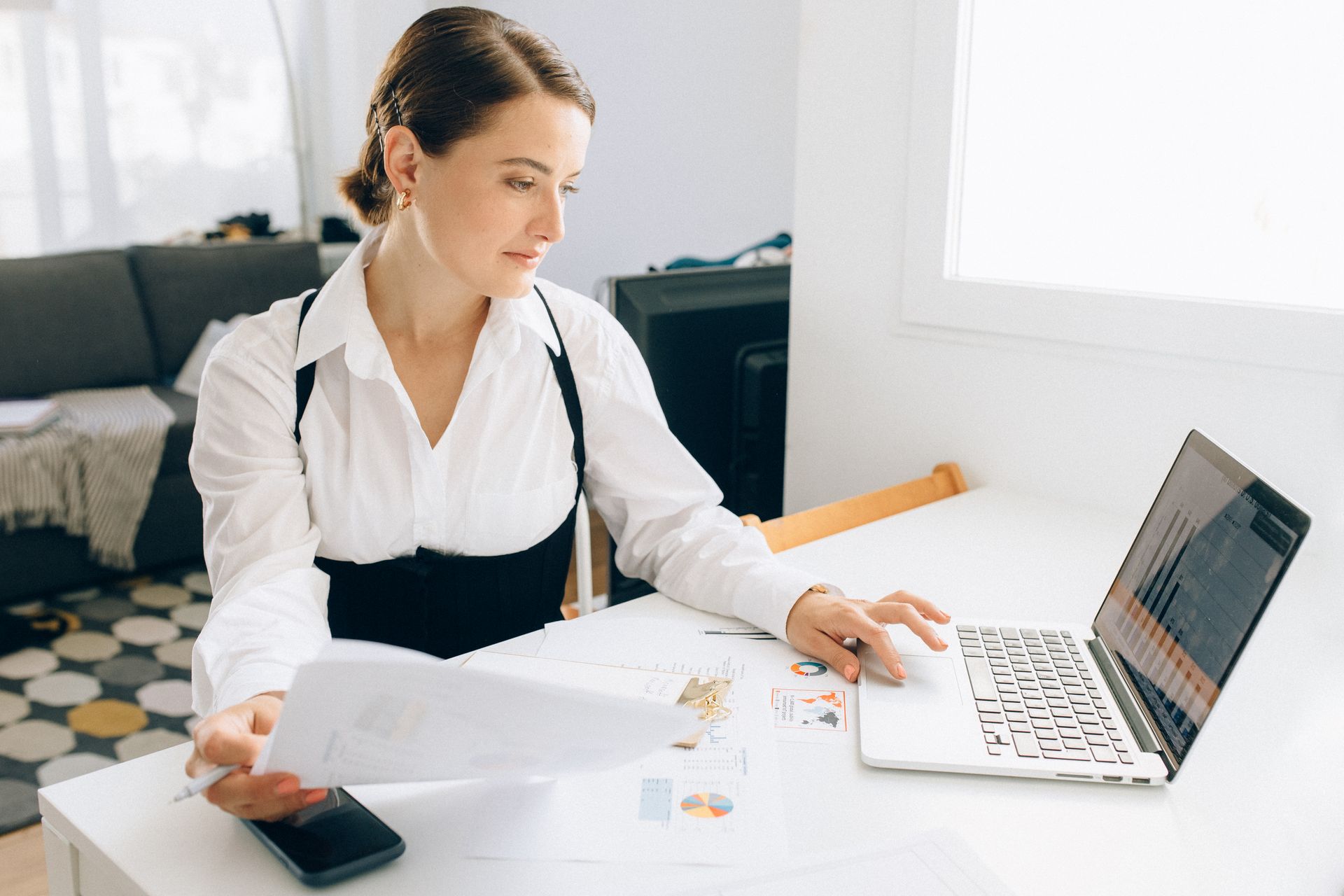 An analyst at a laptop