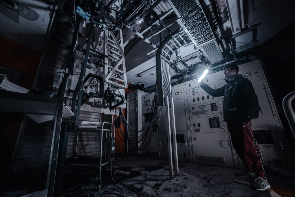 A technician inspecting cables