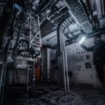 A technician inspecting cables