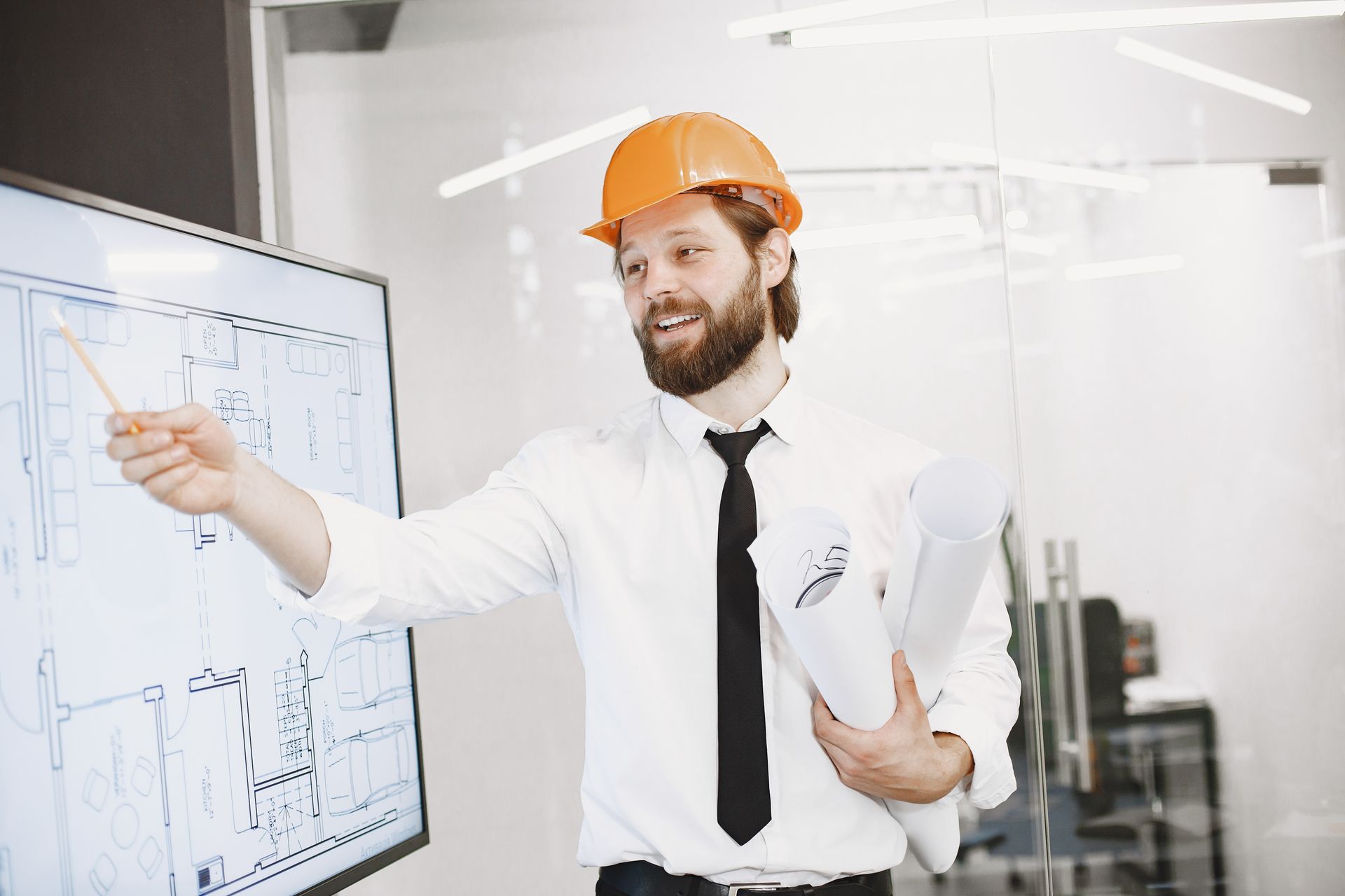 An engineer at a whiteboard