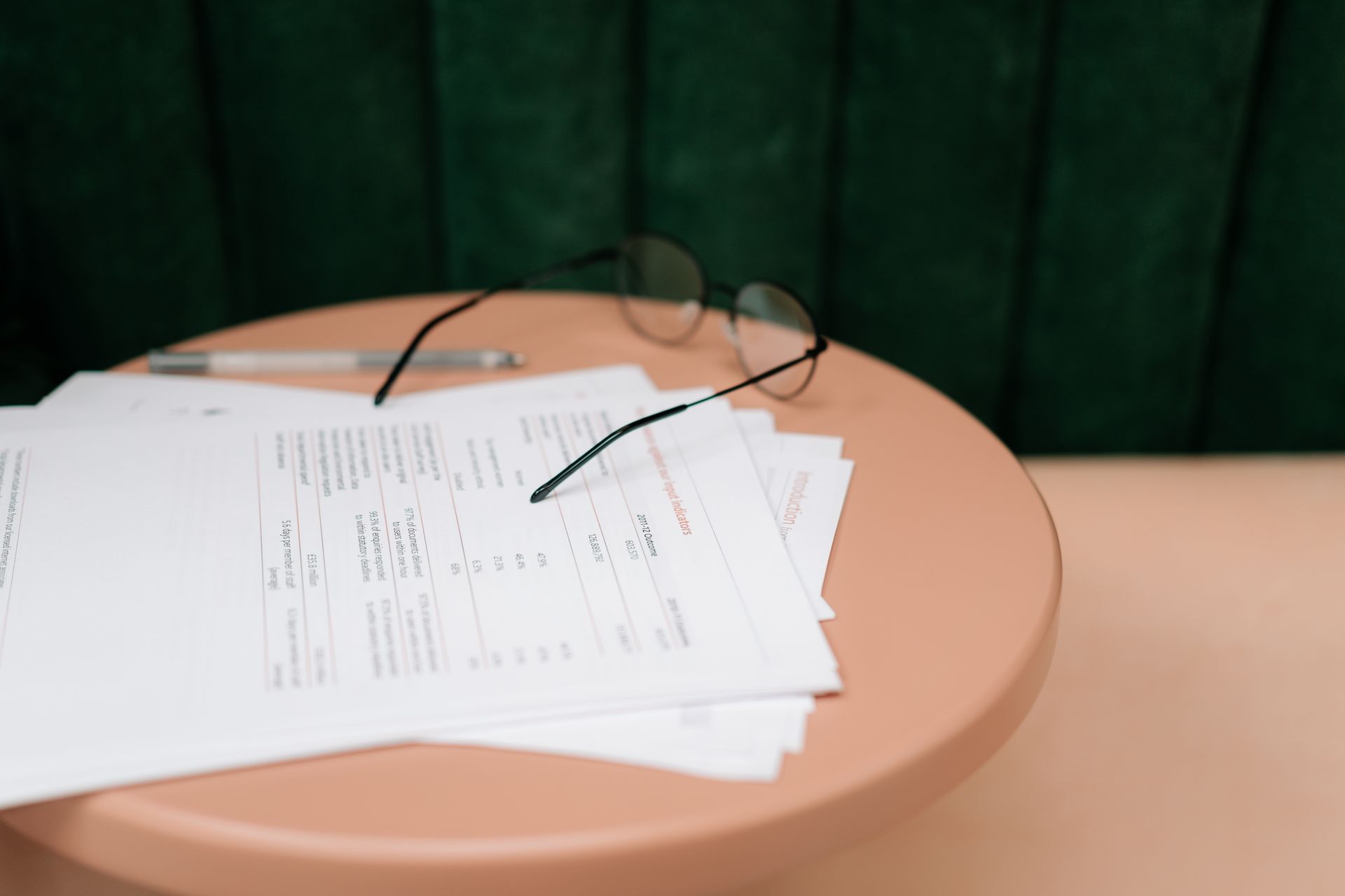 A reviewer reading a printout