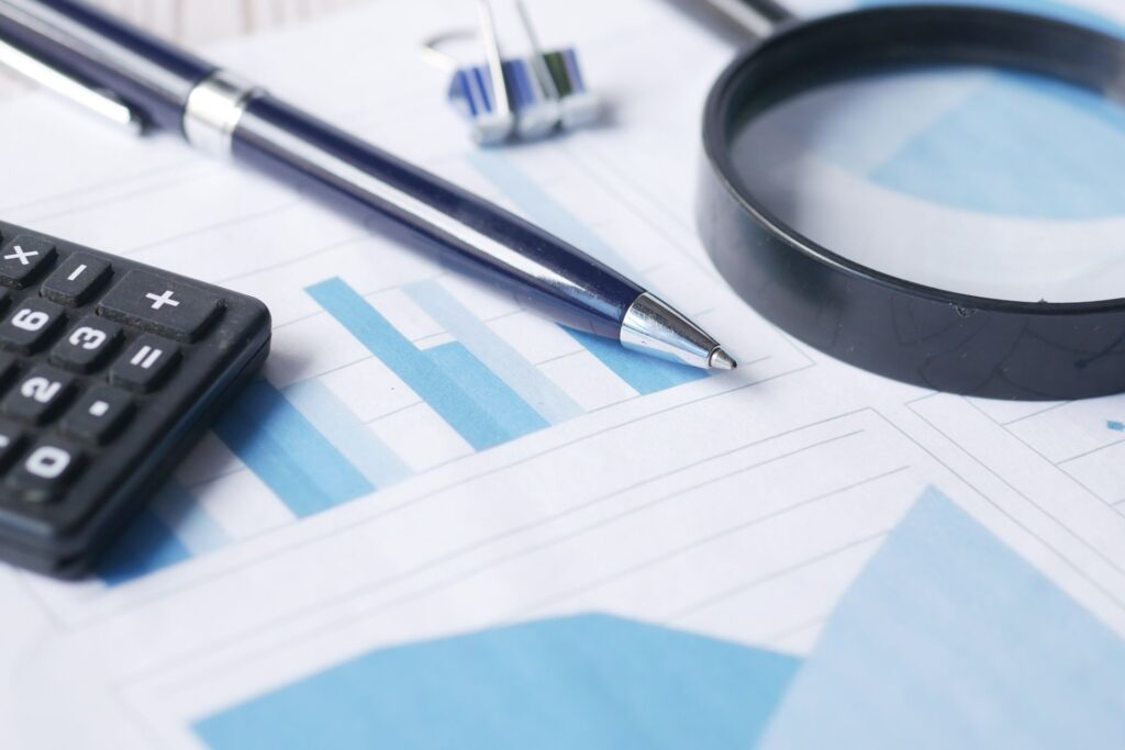 An SEO audit report document on a desk