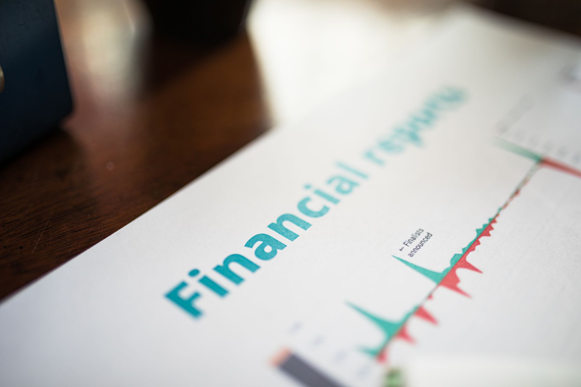 Printed financial report with charts