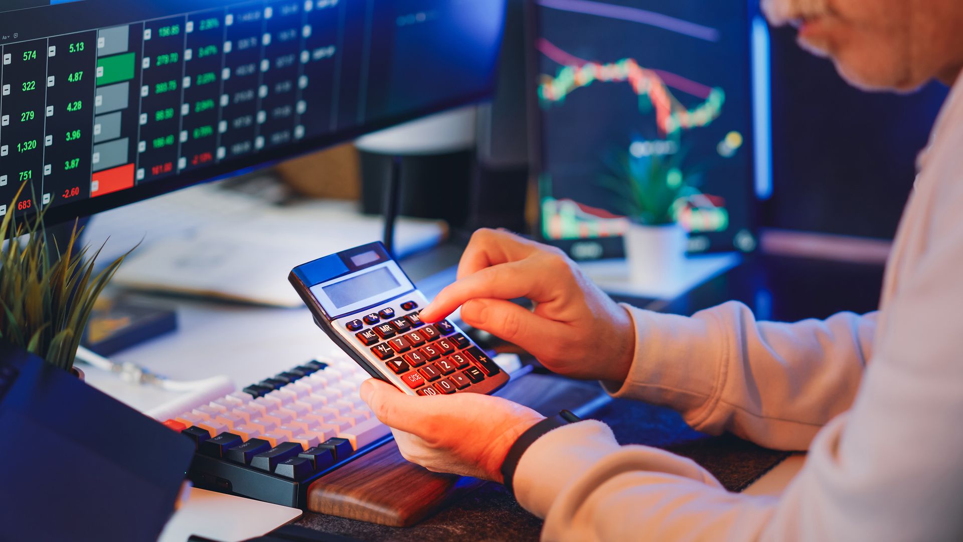An analyst with a calculator