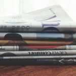 Newspaper headlines on a table