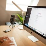 A browser tab and a search result title on a monitor