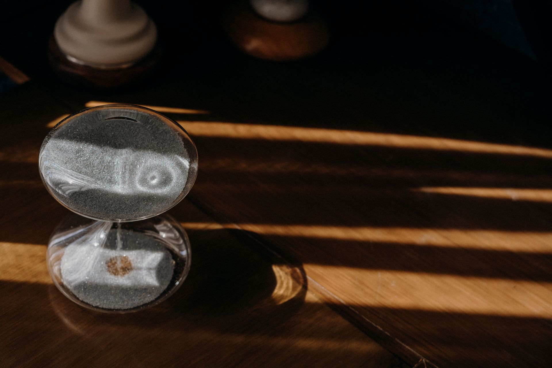 An hourglass on a table