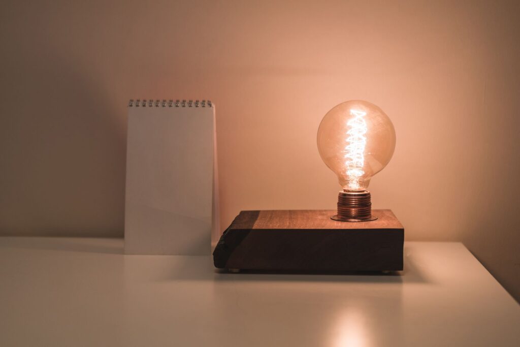 A light bulb on a desk