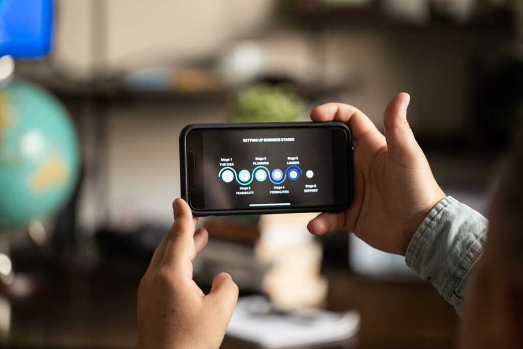 A developer with an app on a phone