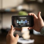 A developer with an app on a phone