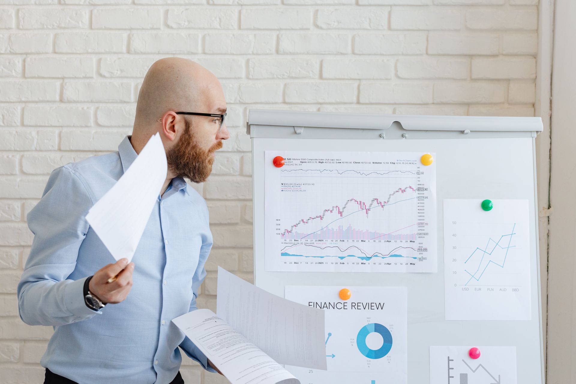 An analyst comparing charts