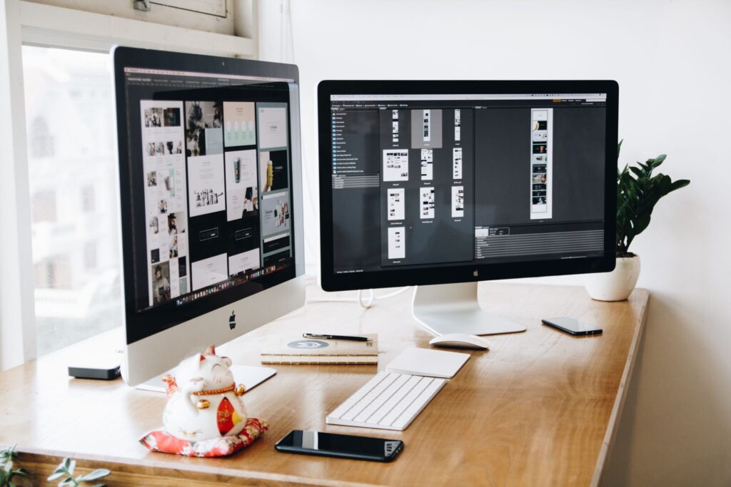 A designer portfolio website on a monitor