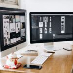 A designer portfolio website on a monitor