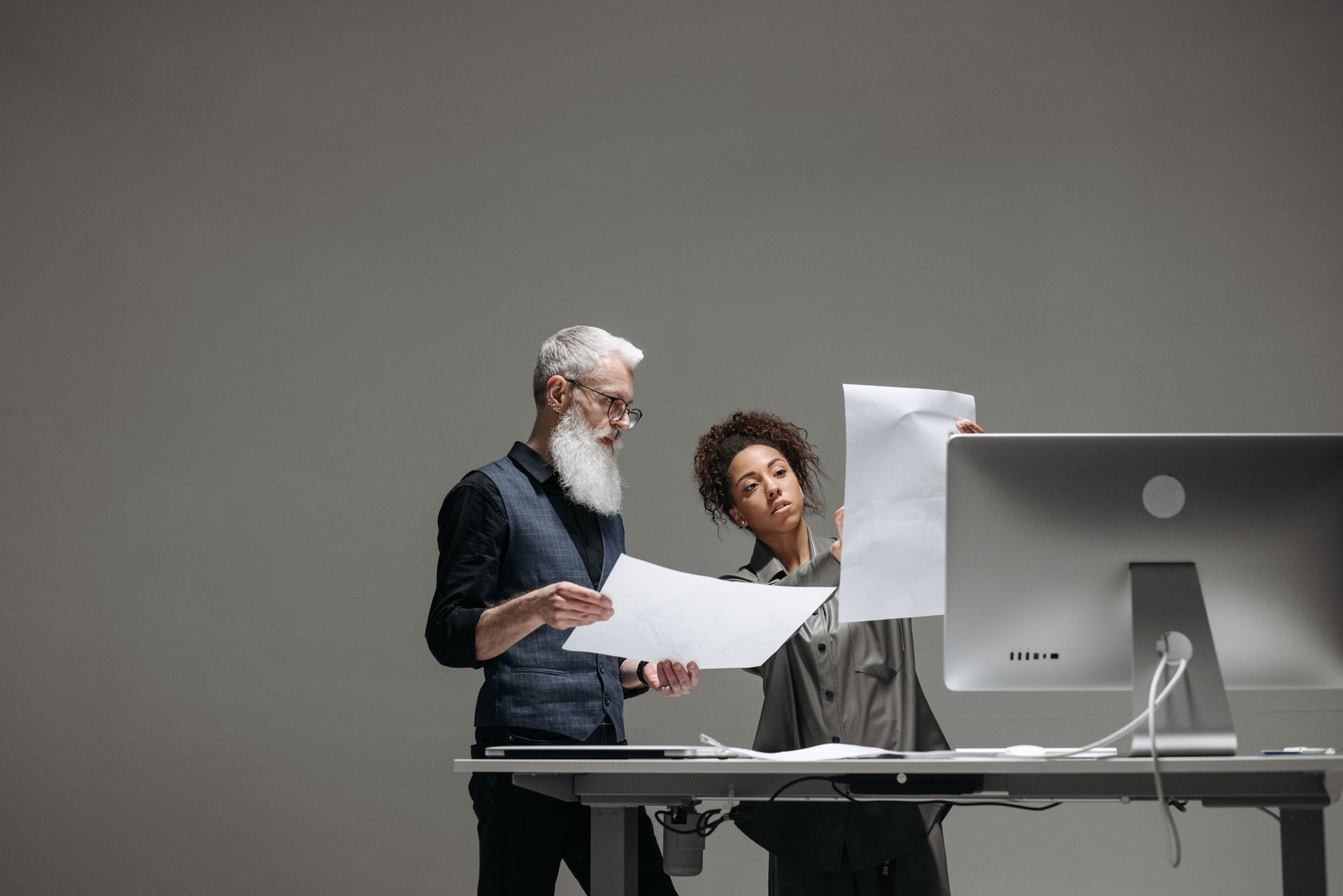A designer at a large monitor