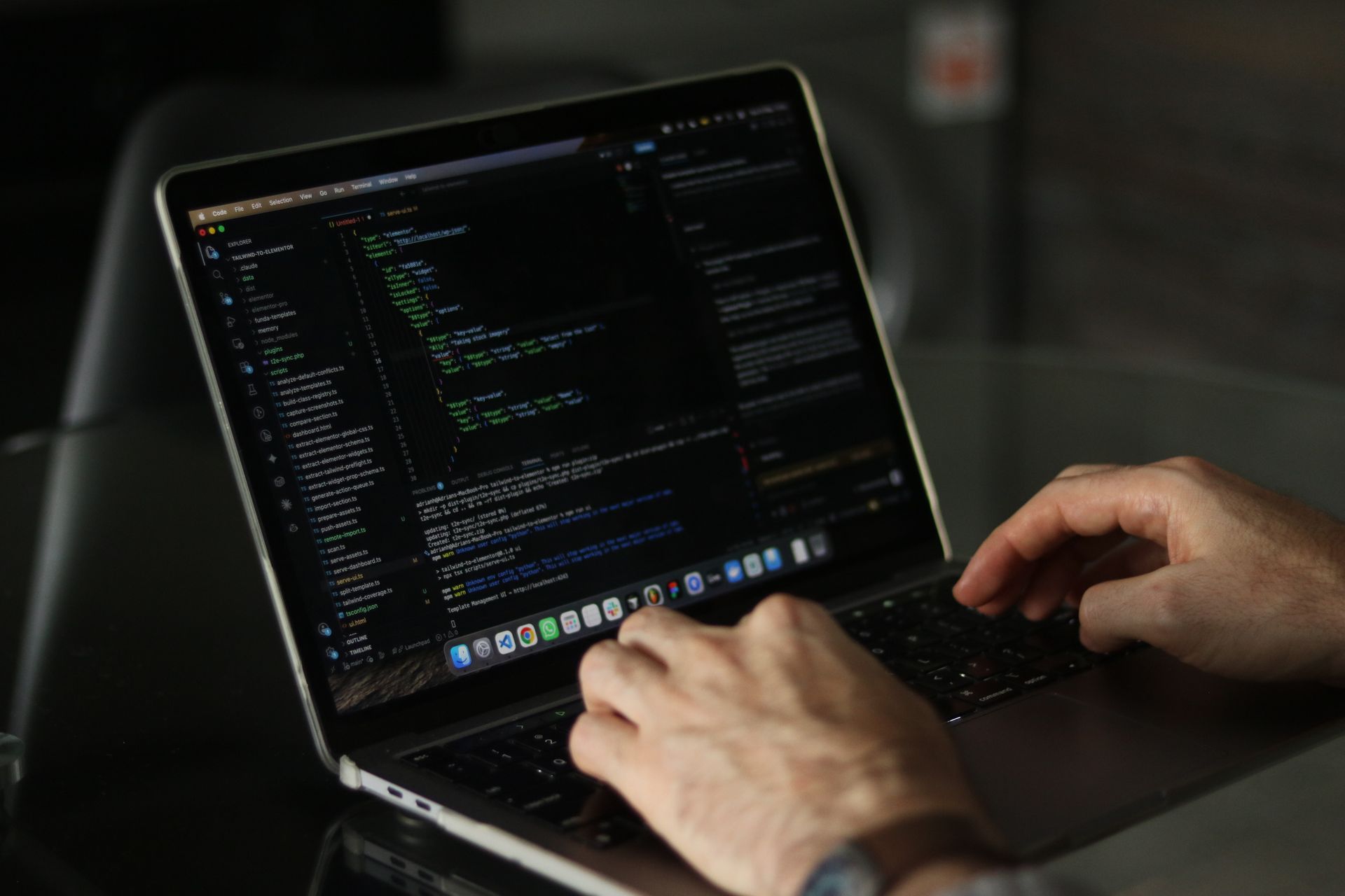 A developer at a laptop