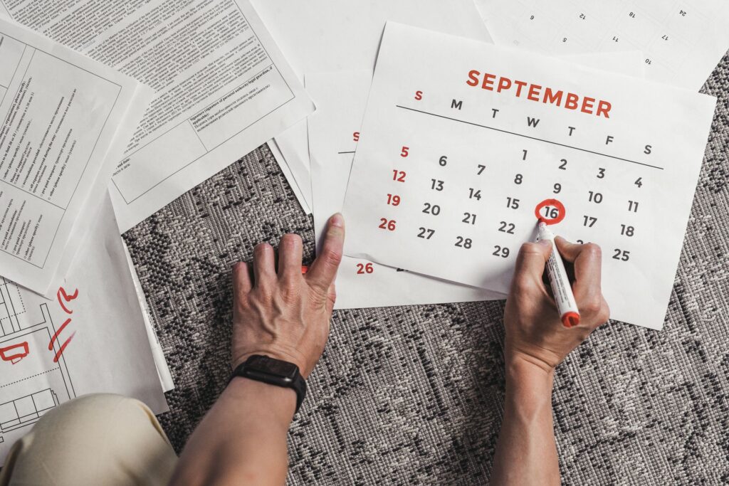 A desk calendar with dates circled