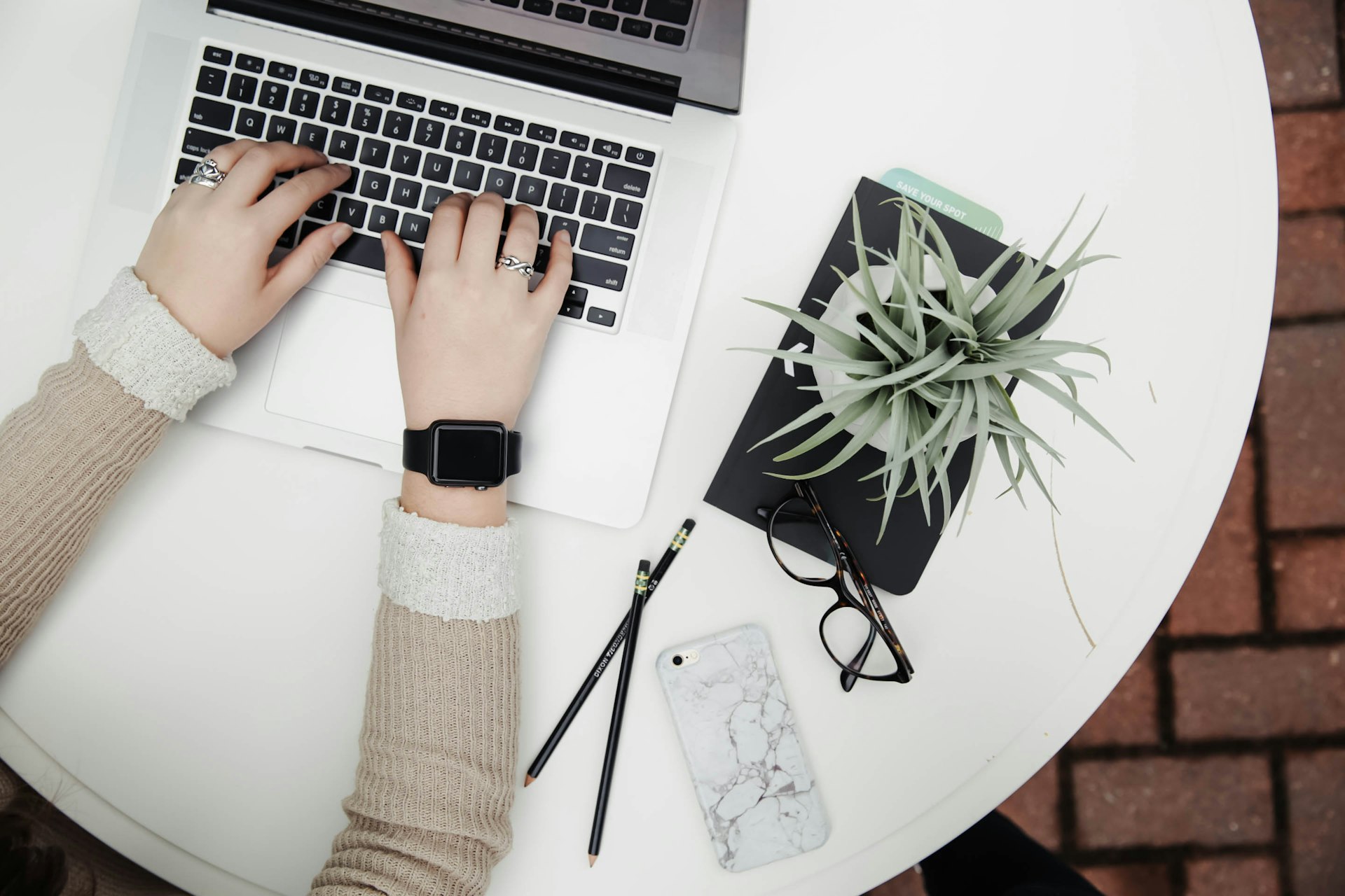 A blogger writing on laptop