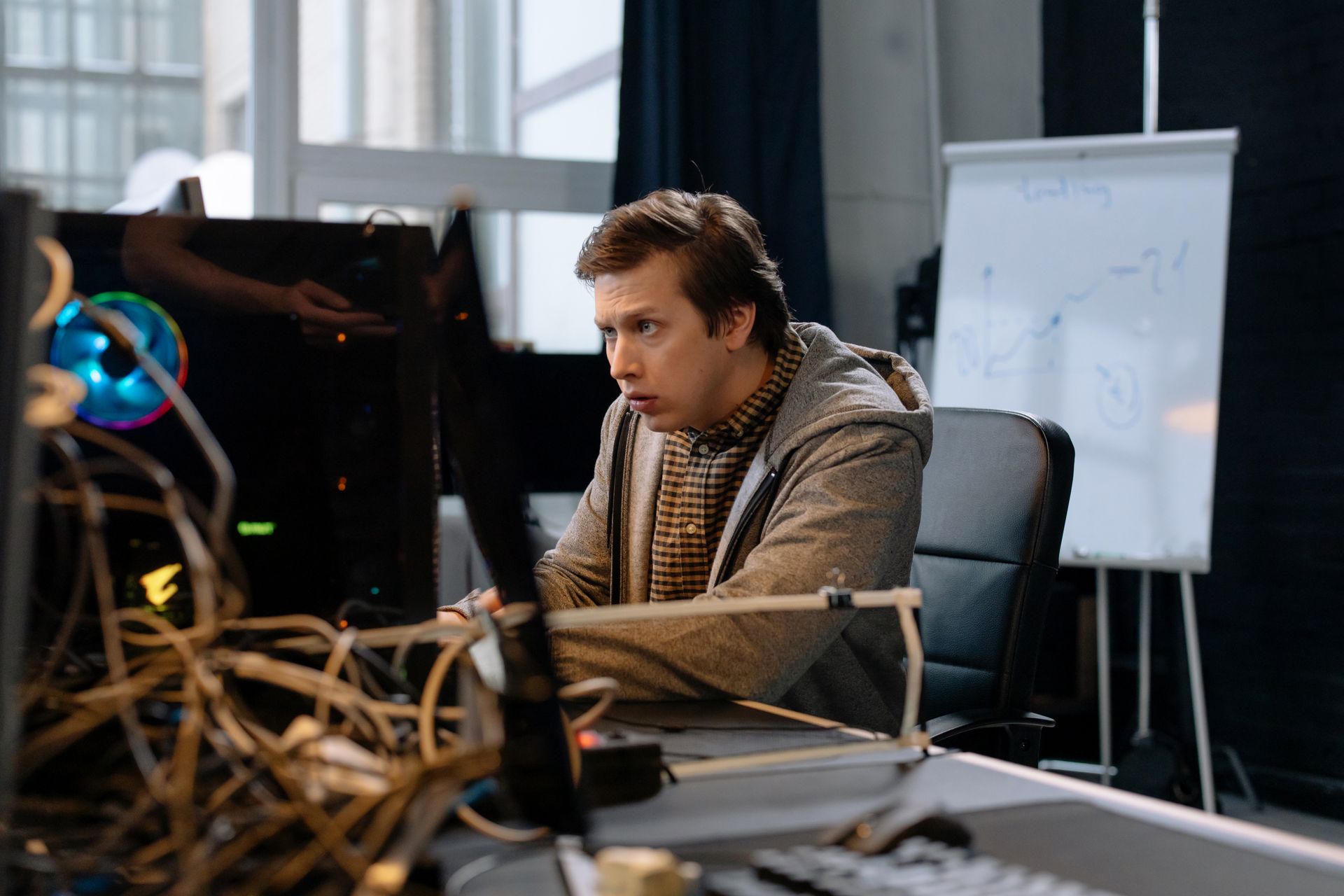 A developer thinking at computer