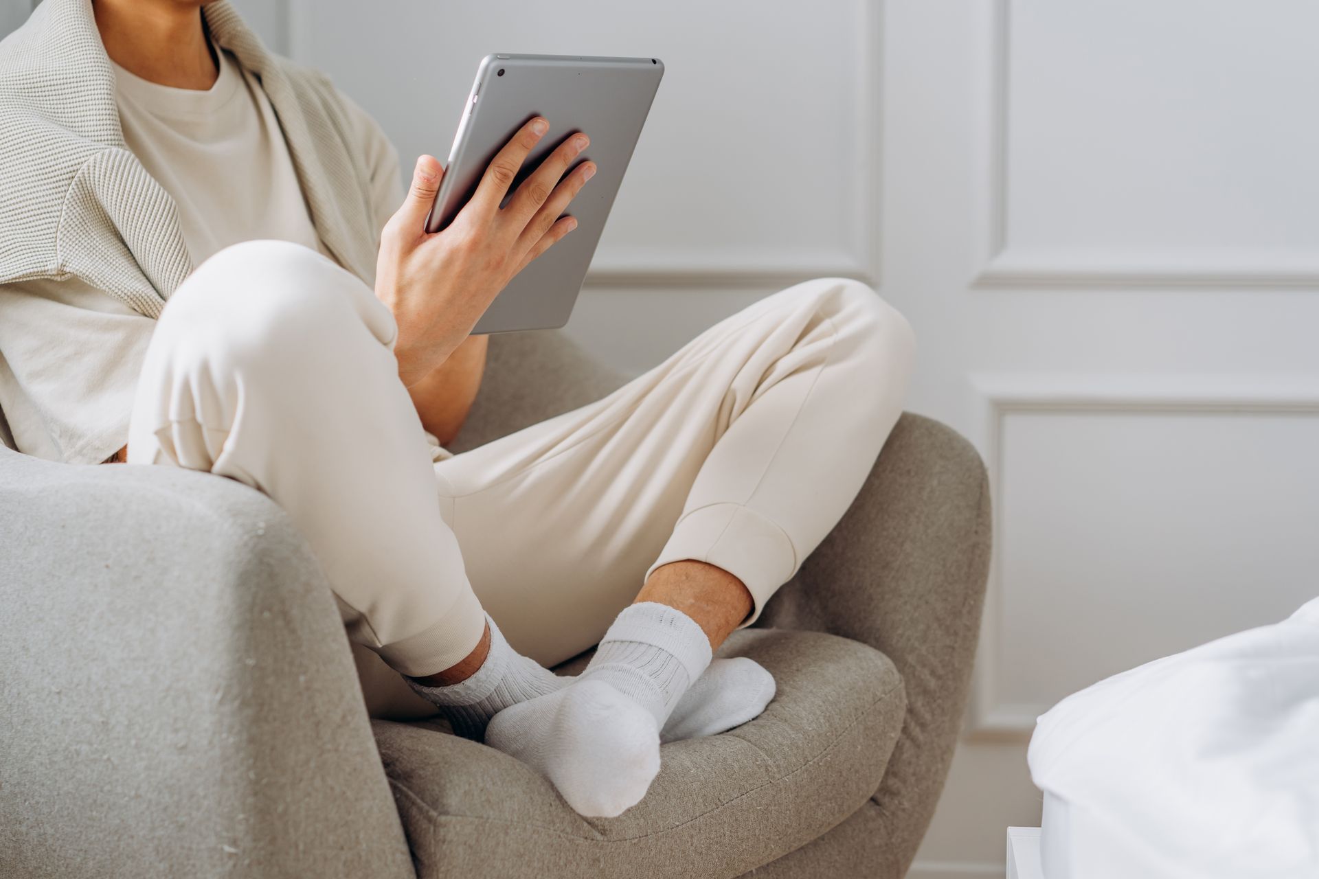 A person reading blog on tablet