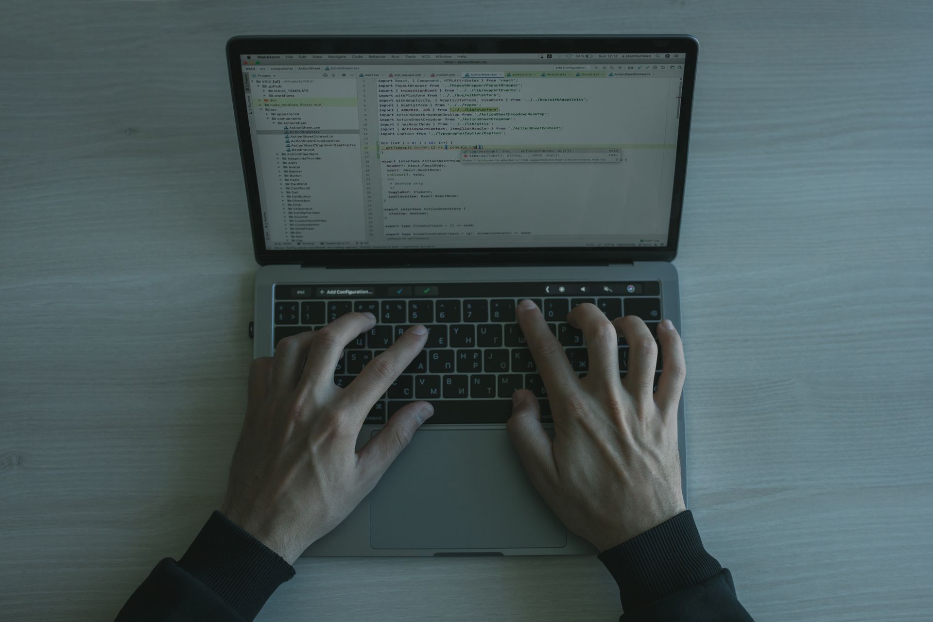 A programmer typing code