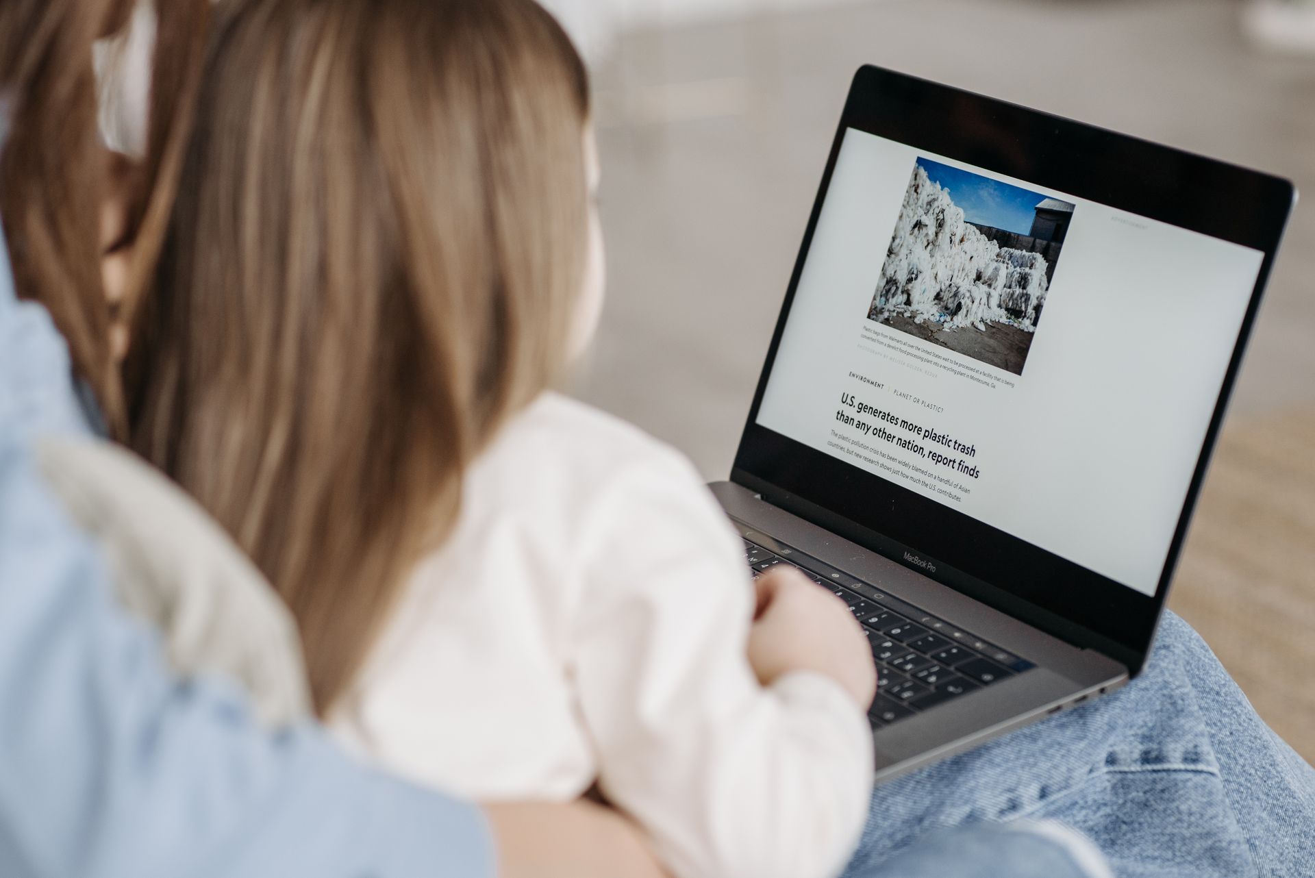A long-form review article on a laptop